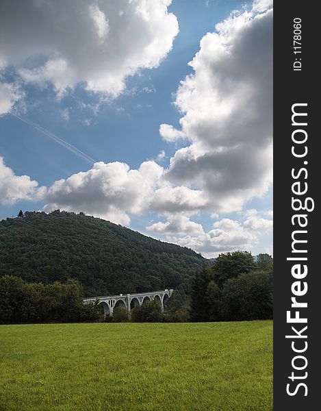 Railroad brdige in germany under a cloudy sky. Railroad brdige in germany under a cloudy sky.