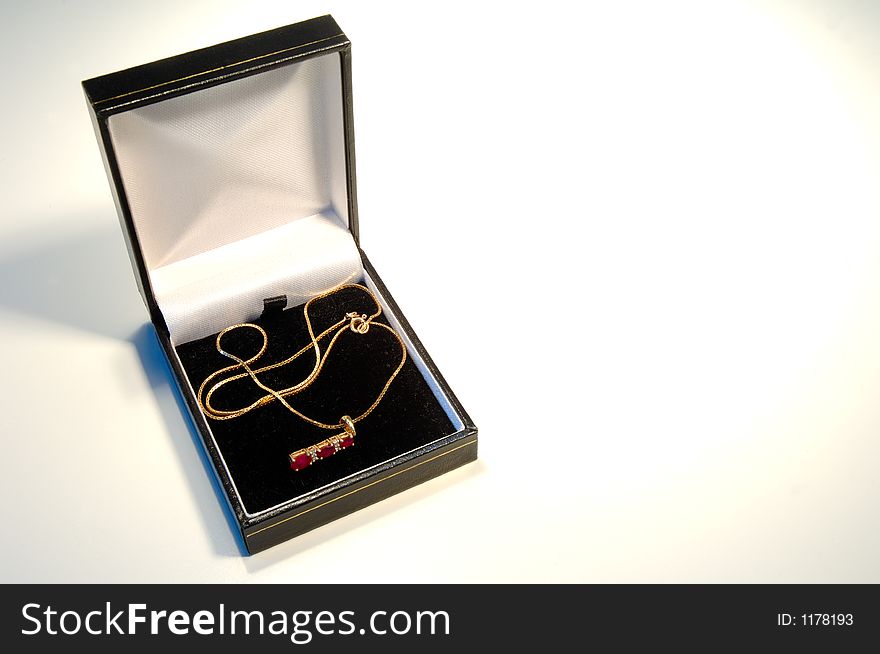 Necklace in gift box on white. Necklace in gift box on white