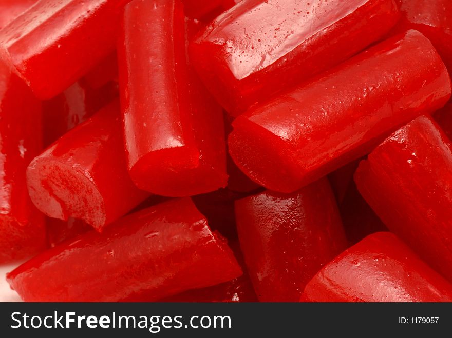 Macro photo of red licorice bits. Macro photo of red licorice bits