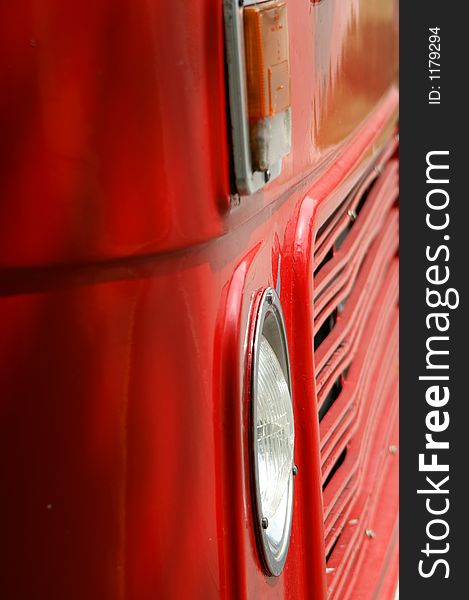 A closeup of a red double decker bus. A closeup of a red double decker bus