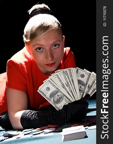 Young blondy woman holding large sum of dollar cash. Young blondy woman holding large sum of dollar cash