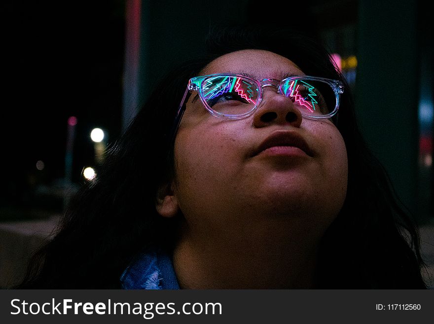 Woman Wearing Eyeglasses During Nighttime