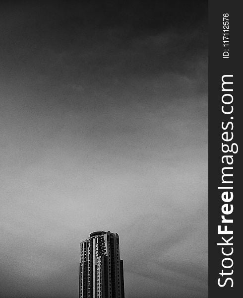 Greyscale Photography of Concrete Building