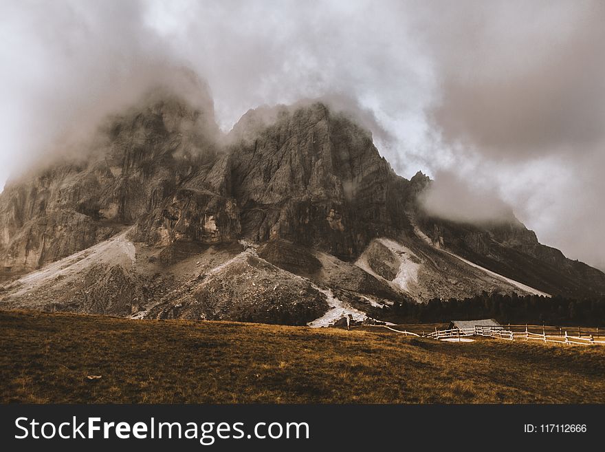 Gray House Under Gray And White Volcano&x27;s Foot