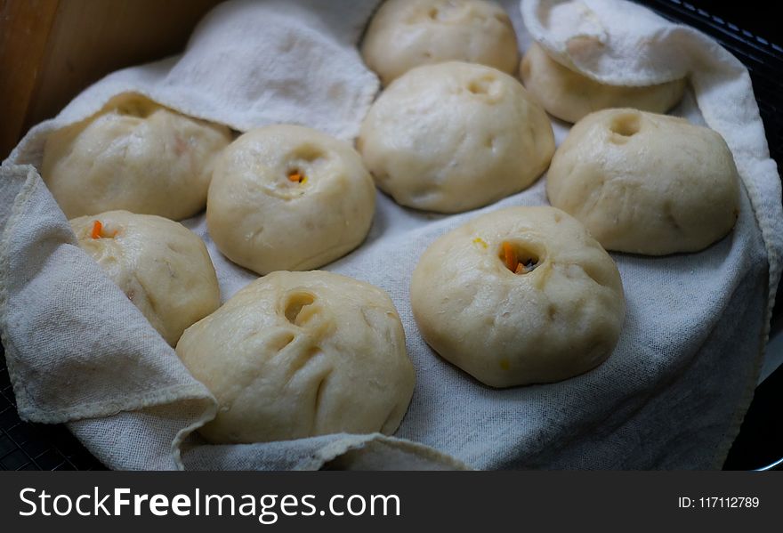 Dumplings on White Textile