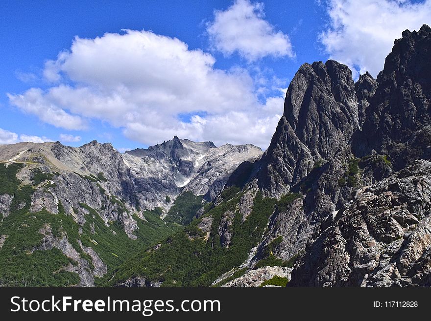 Gray Mountain Under White Cloud Blue Skies