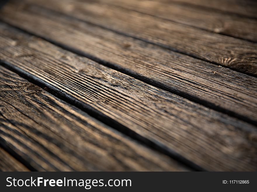 Selective Focus Photography Of Brown Wooden Floor Parquet