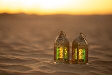 Traditional Ornamental Arabic Candle In Desert. Royalty Free Stock Images
