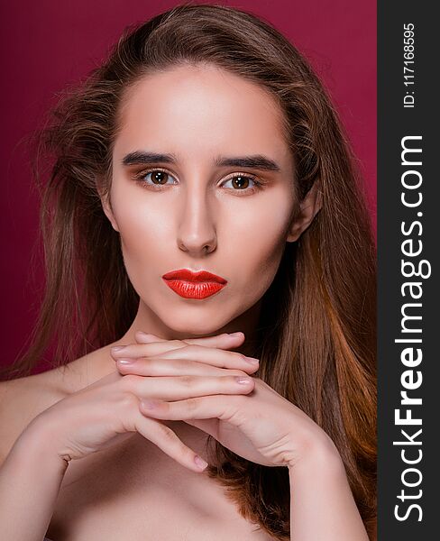 Beauty portrait of gorgeous brunette woman with clean skin and red lips. Beauty portrait of gorgeous brunette woman with clean skin and red lips