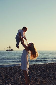 Mom With Baby On The Beach In Side, Turkey Royalty Free Stock Photo