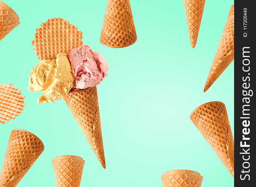 Ice cream and waffle cone on fresh green