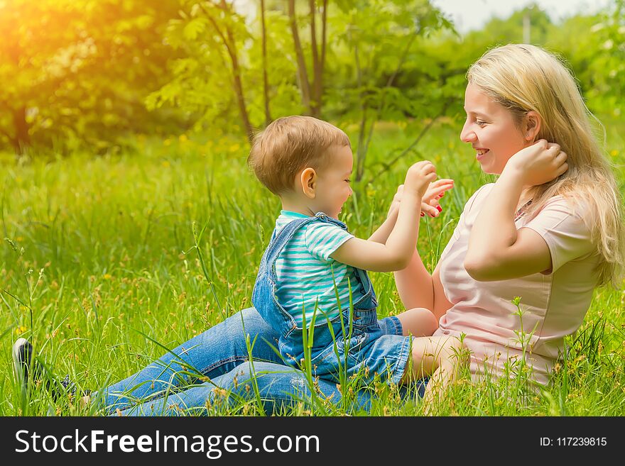 Mom with a child in nature in the Park