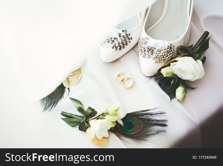 White stylish wedding shoes for bride. Close-up.