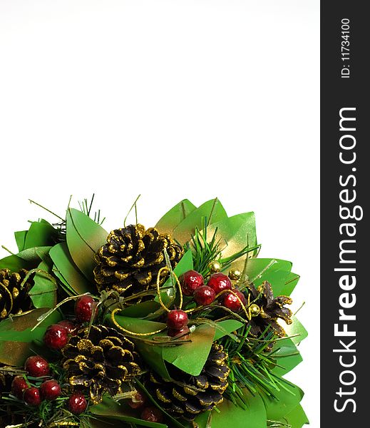 Pine cones and berries on a white background with copyspace. Pine cones and berries on a white background with copyspace