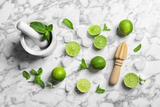 Flat Lay Composition With Lime, Juicer And Mortar Stock Images