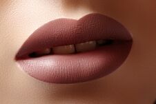 Close-up Female Lips With Fashion Natural Coffee Lipstick Makeup. Macro Lip Stick Make-up Royalty Free Stock Photos