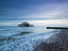 The Beach At Old Brighton Pier Stock Images