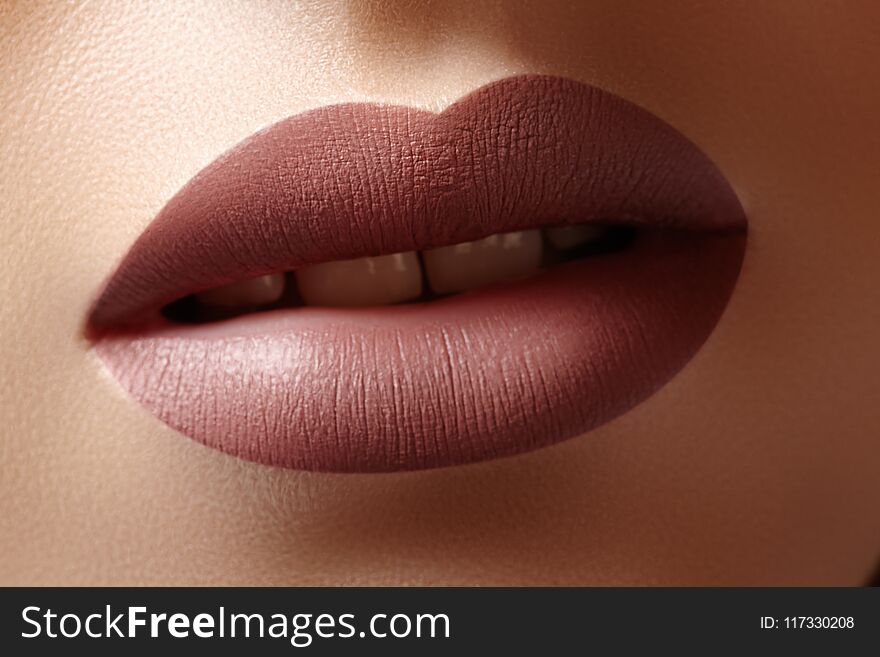 Close-up Female Lips with Fashion Natural coffee Lipstick Makeup. Macro Lip Stick Make-up. Beauty shot
