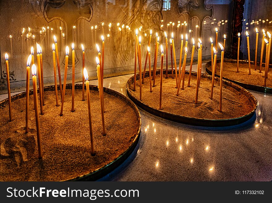 Prayer candles lit in Monastery of the Holy Cross in Cyprus
