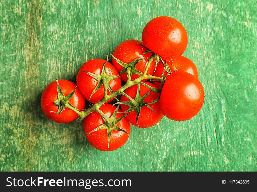 Fresh Ripe Tomatoes On Wooden Background