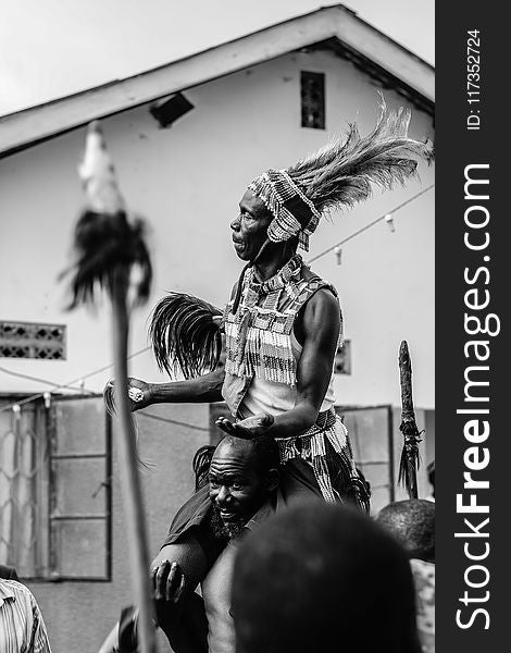 Man Wearing Warbonnet Performing