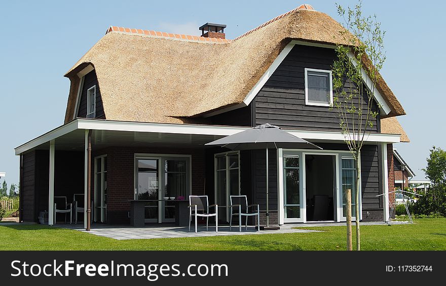 Black And Brown Wooden House