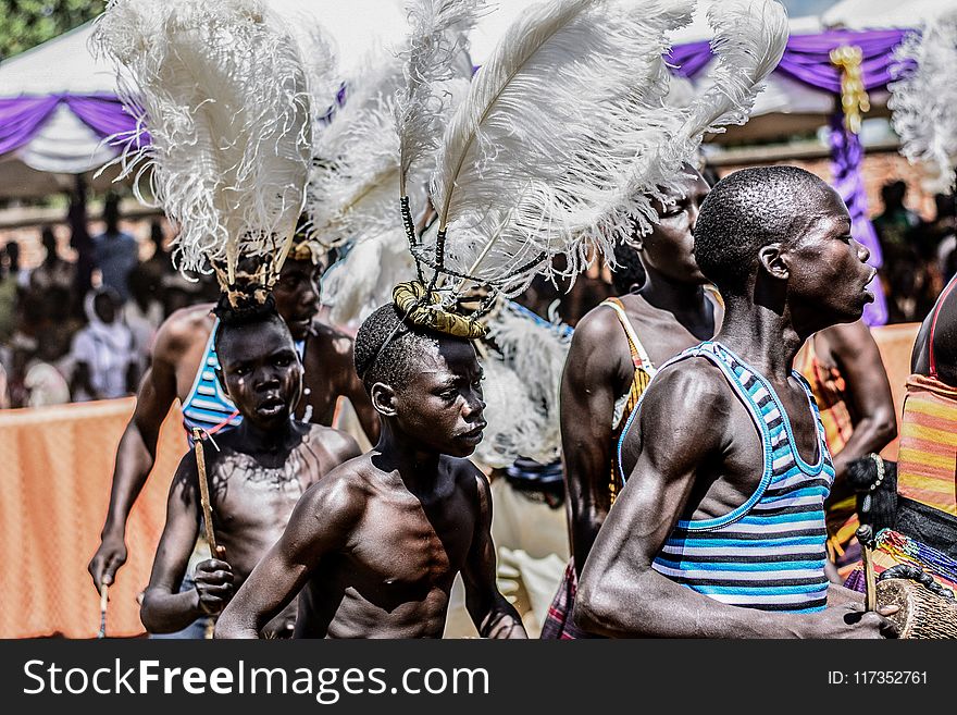 Group Of Boys With White Feather Headdress