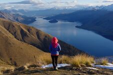 Lady Hiker Standing On Top Of The Mountain - Isthmus Peak With A View Of The Wanaka Lake Stock Photography