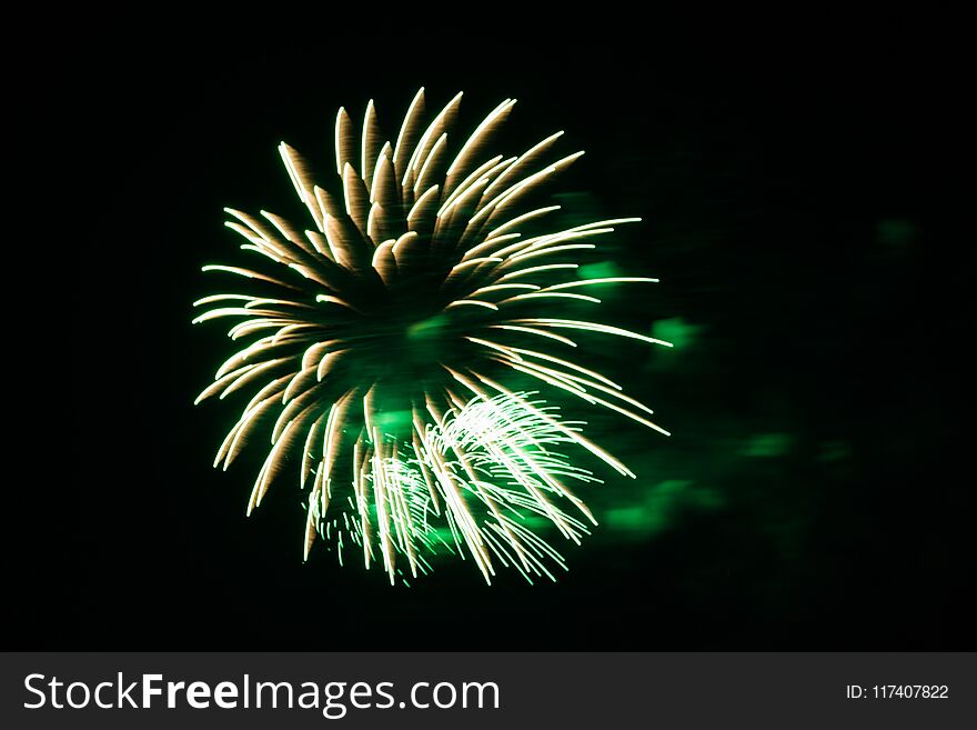 Evening fireworks in honor of a holiday the Victory Day in the night sky in Moscow city by military forces