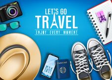 Let`s Go Travel Enjoy Every Moment Text With Realistic Shoes, Hat, Passport, Phone And Camera For Vacation In Blue Background Stock Images