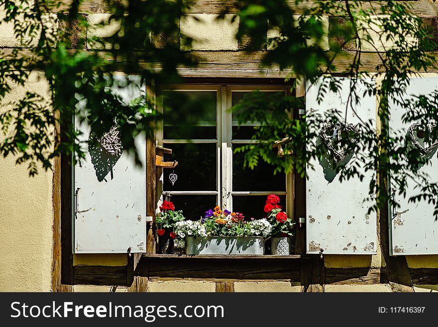 Old beautiful windows in historical center of Colmar, alsacien s