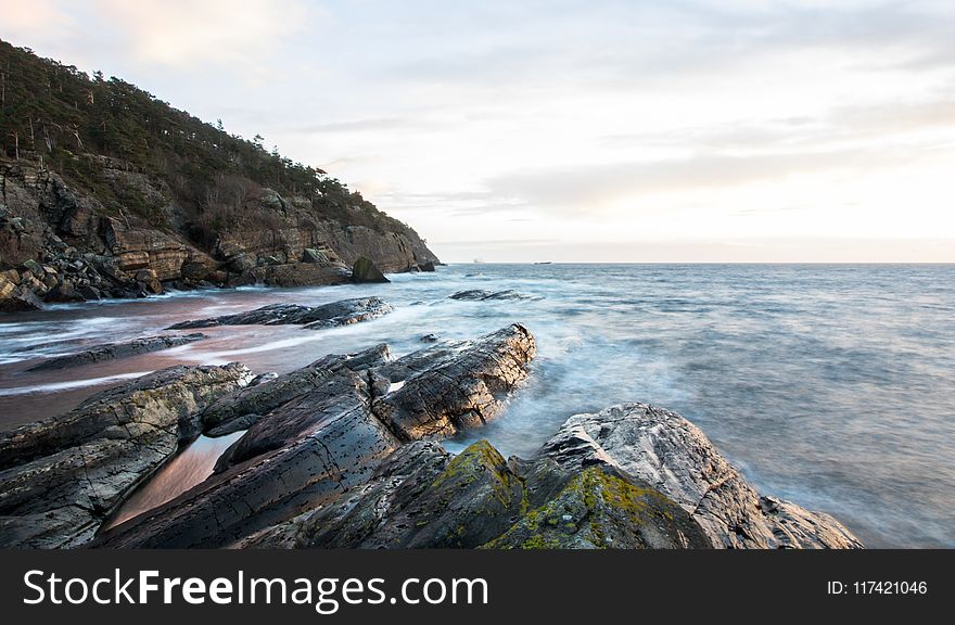 Time Lapse Photo of Rocky Beach