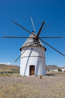 Windmill Under Blue Sky In Almeria, Andalucia Royalty Free Stock Photos