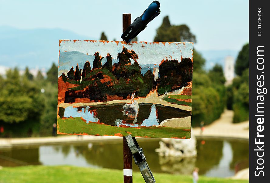 Painting of Body of Water on Front of the Model during Day
