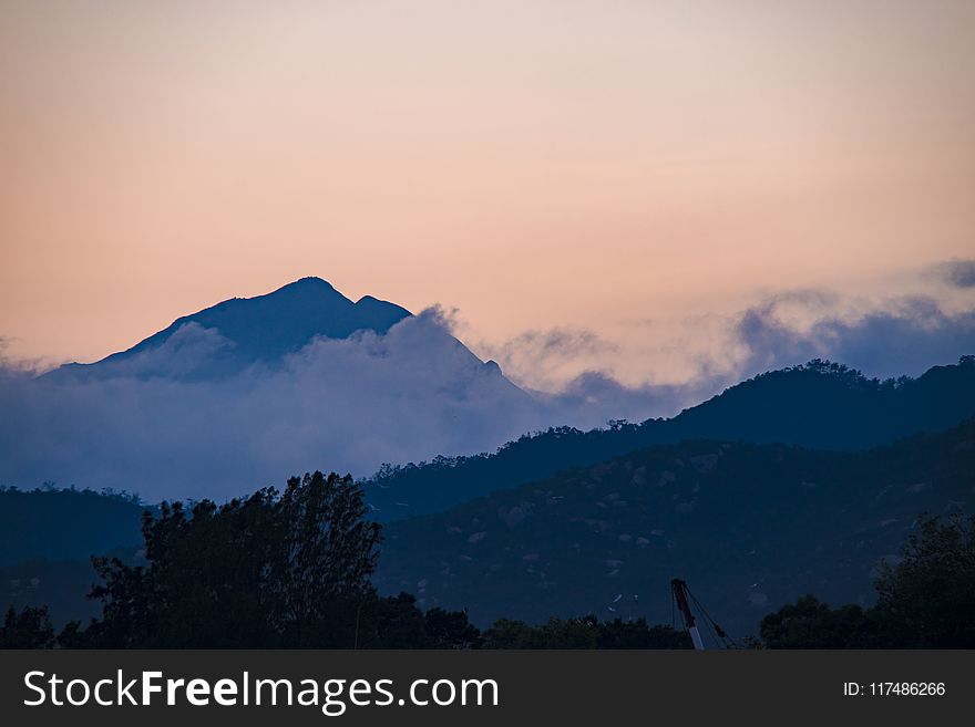 Silhouette Of Mountain During Sunset