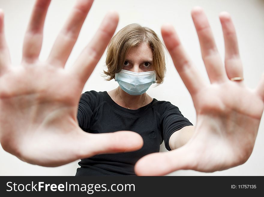 Woman with medical mask in the street