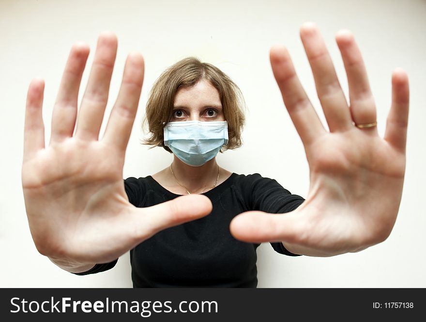 Woman with medical mask in the street
