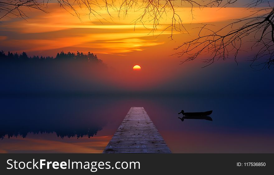 Brown Dock during Sunset