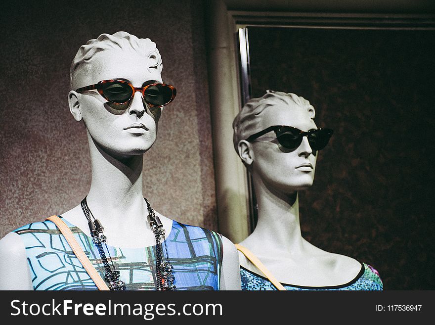 Two Female Mannequins Wearing Sunglasses