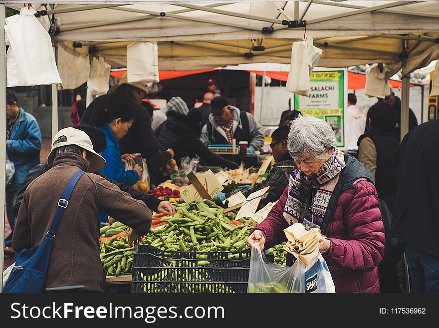 Group of People in Marketplace