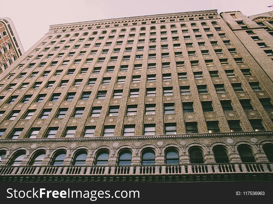 Low Angle Photography Of Brown Building