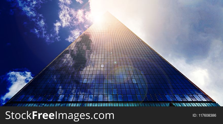 Low Angle Photograph of Pyramid Glass during Calm Weather