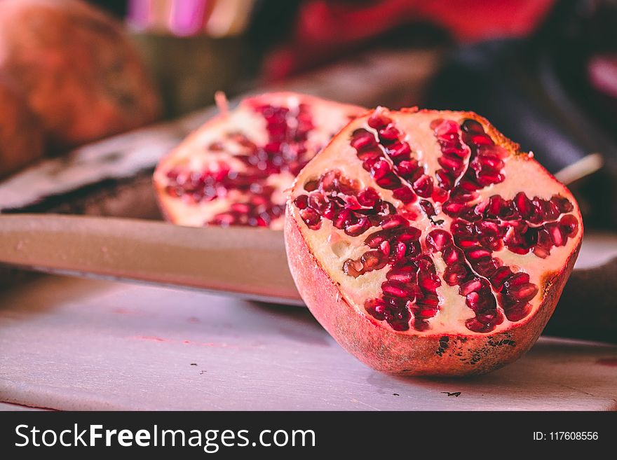 Selective Focus Photography of Sliced Passion Fruit