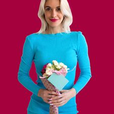 Woman With A Bouquet Of Flowers Royalty Free Stock Photos