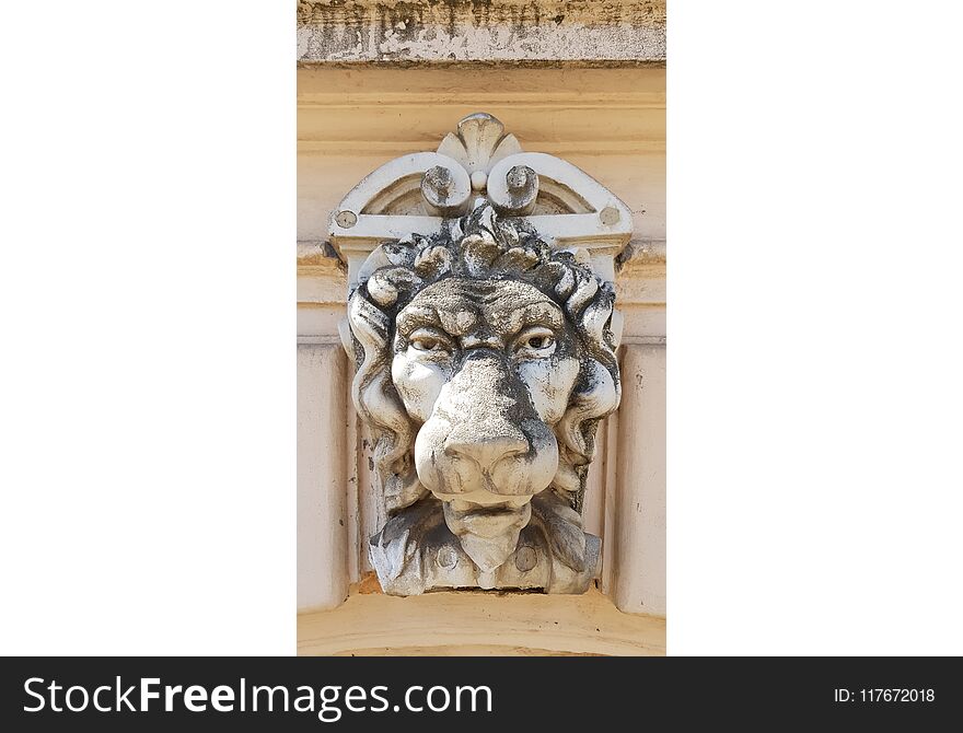 Old Sculpture Of Lion Face Dusty Monument Closeup