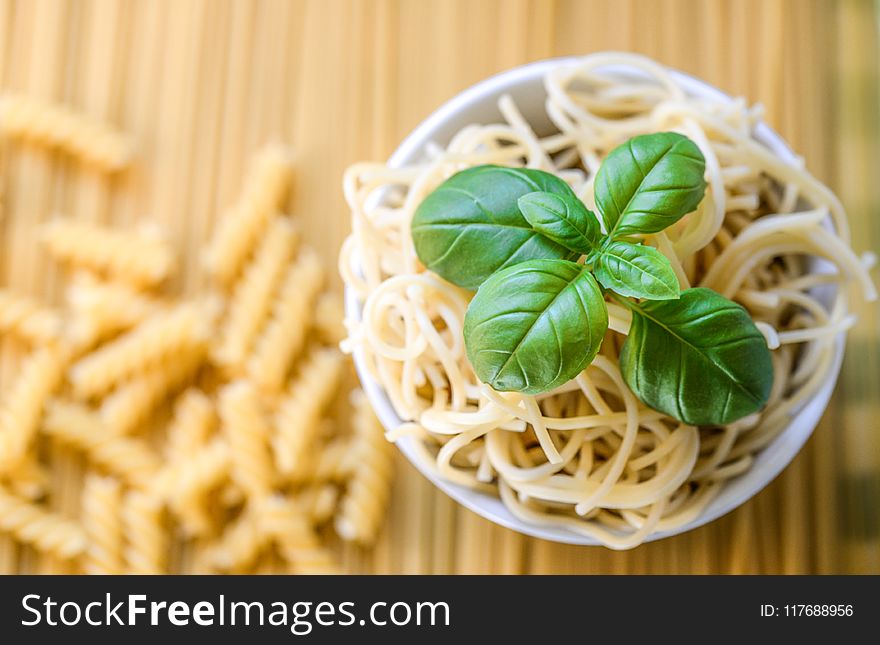 Pasta Noodles With Fresh Basil Leaves