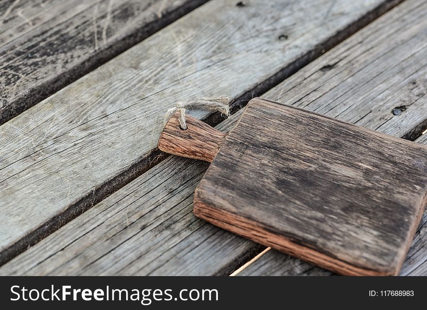 Brown Wooden Chopping Board Closeup Photography