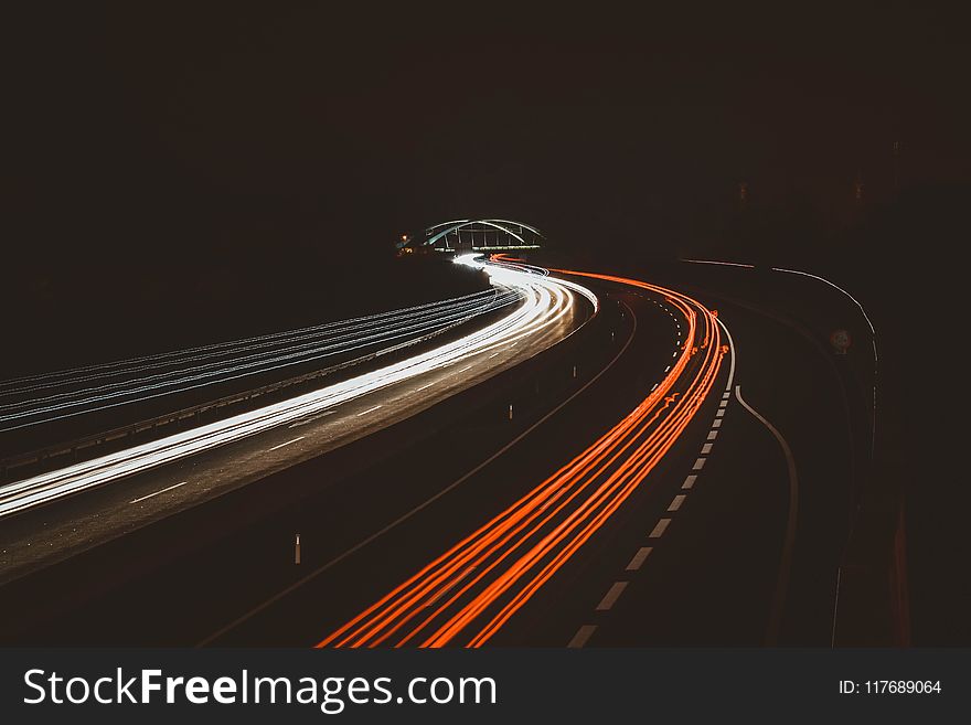 Time Lapse Photography Of Vehicles On Road During Nightime