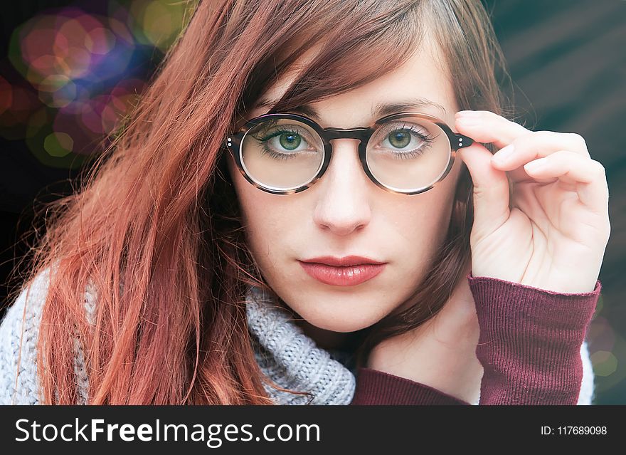 Woman With Brown Hair Wearing Eyeglasses