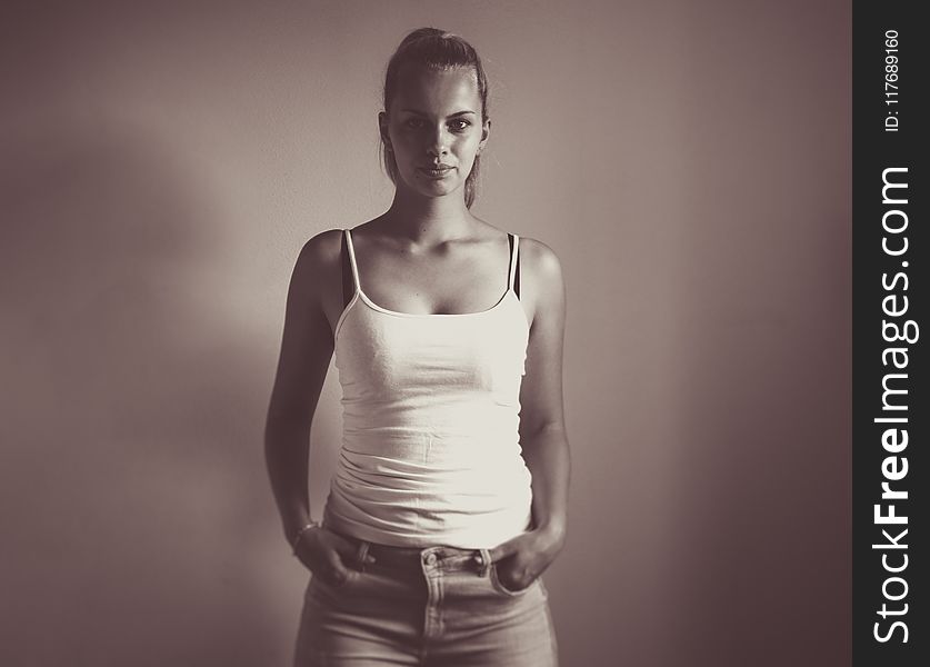 Sepia Photography of Woman Wearing White Camisole